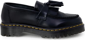 Këpucë të ulëta Dr. Martens për femra, të zeza